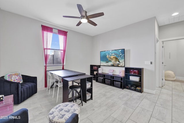 dining area featuring a ceiling fan, baseboards, and visible vents