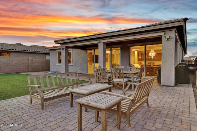 view of patio / terrace featuring fence
