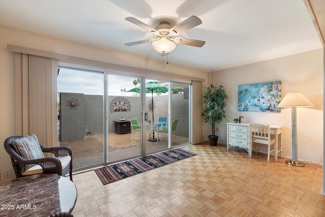 interior space featuring ceiling fan and light parquet floors