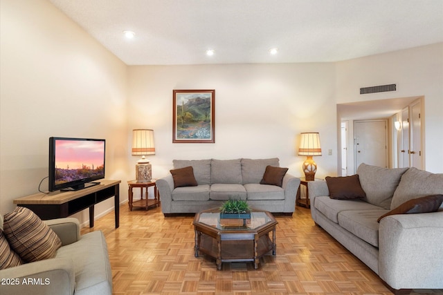 living room featuring light parquet flooring