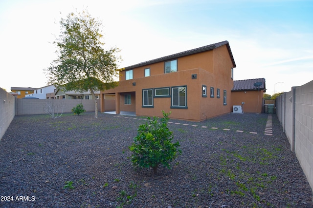 rear view of property with a patio