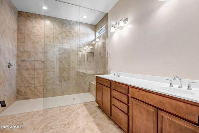 bathroom with tile patterned floors, walk in shower, recessed lighting, and a sink