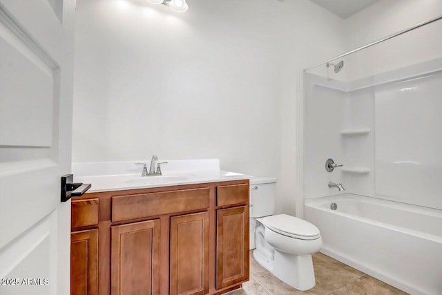 full bathroom with tile patterned floors, vanity, toilet, and shower / bathing tub combination