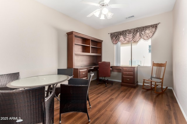 office space with dark wood-type flooring and ceiling fan