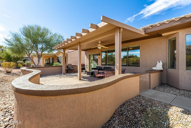 view of patio with ceiling fan