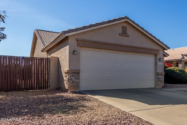 view of home's exterior with a garage