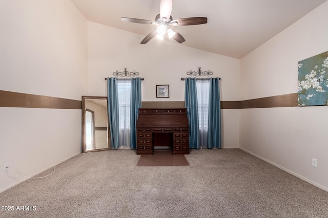 unfurnished living room with ceiling fan, vaulted ceiling, and carpet