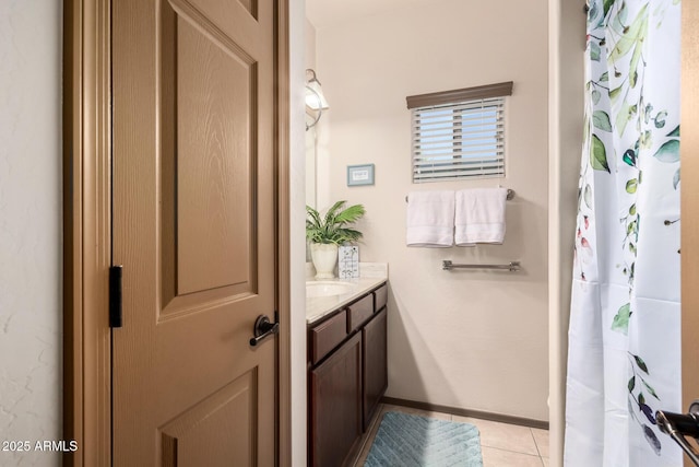 bathroom featuring vanity and tile patterned flooring