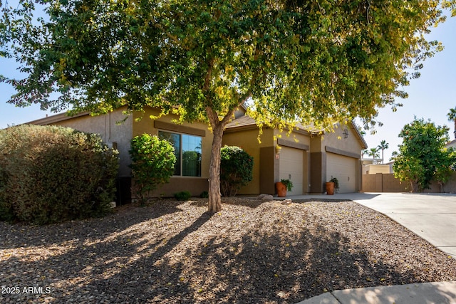 obstructed view of property featuring a garage