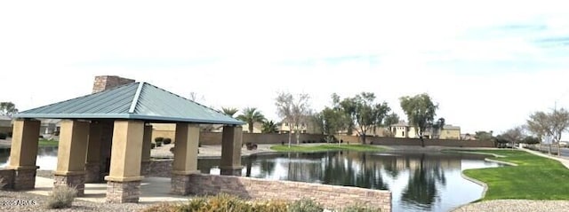 view of community featuring a water view and a gazebo