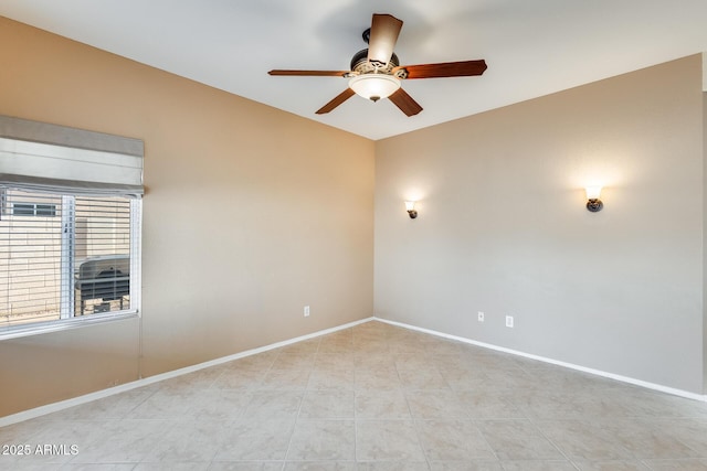 unfurnished room with ceiling fan