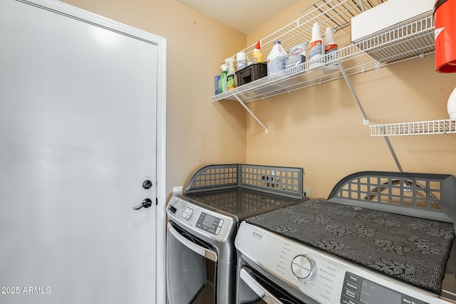 laundry area featuring washing machine and dryer