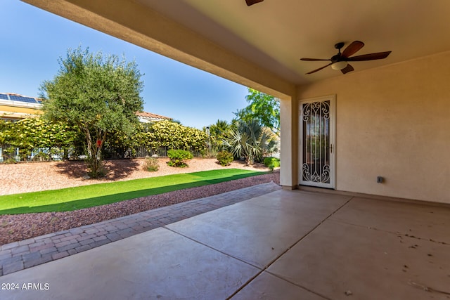 view of patio featuring ceiling fan