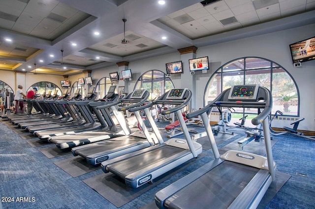 workout area with coffered ceiling and carpet flooring