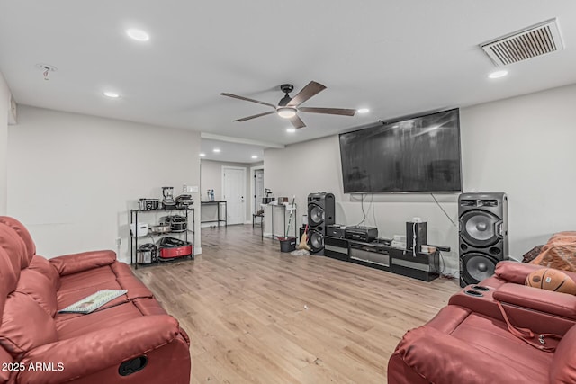 13039 N 19th Ave, Phoenix, AZ 85029 - living area featuring a ceiling fan, wood finished floors, and recessed lighting
