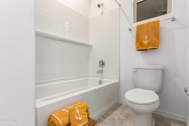 bathroom with shower / bath combination and toilet