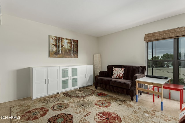 sitting room with light tile floors