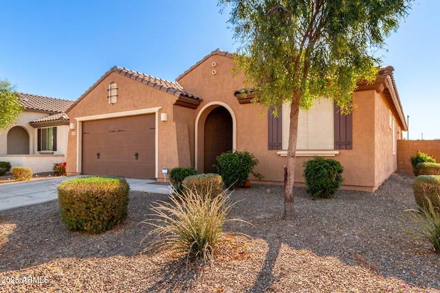 view of front of property with a garage