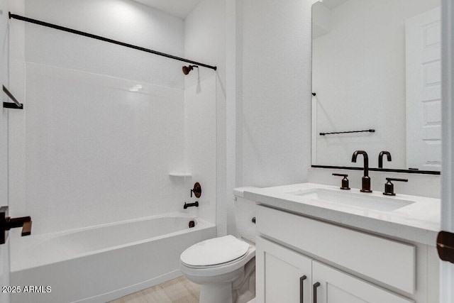 full bathroom with toilet, washtub / shower combination, and vanity