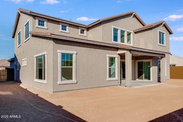 back of house featuring a patio area