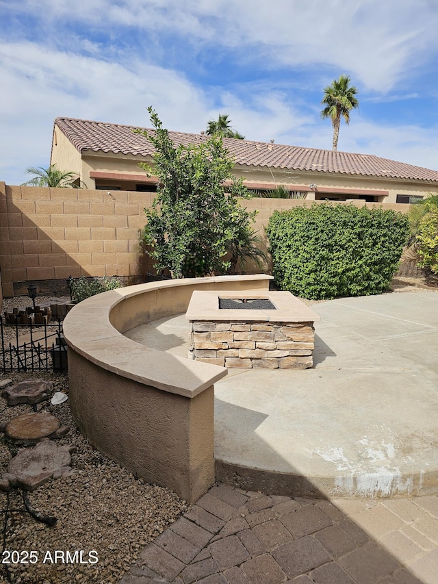14380 W Monte Vista Rd, Goodyear, AZ 85395 - view of patio with an outdoor fire pit