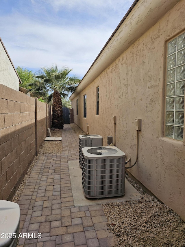 14380 W Monte Vista Rd, Goodyear, AZ 85395 - fenced backyard featuring central AC and a patio area