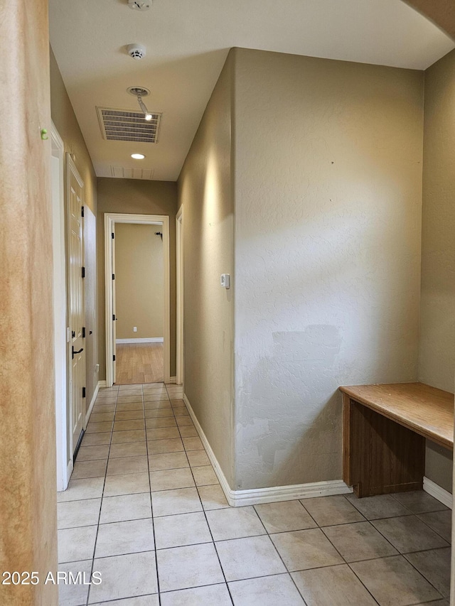 14380 W Monte Vista Rd, Goodyear, AZ 85395 - corridor with light tile patterned flooring and baseboards
