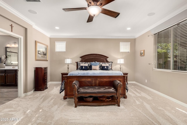 bedroom featuring multiple windows, crown molding, and light colored carpet