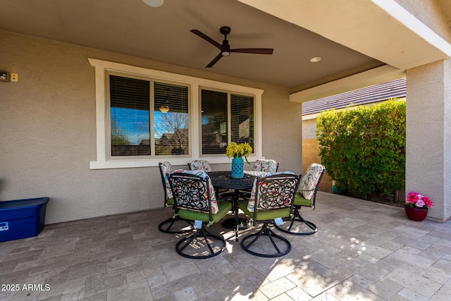 view of patio / terrace featuring ceiling fan