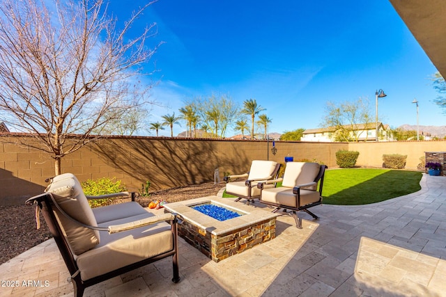 view of patio / terrace with a fire pit