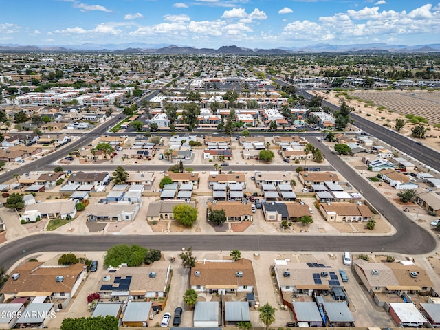 birds eye view of property featuring a mountain view and a residential view