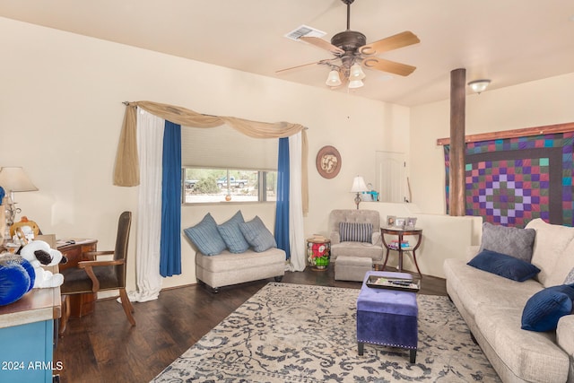 living room featuring dark hardwood / wood-style flooring and ceiling fan