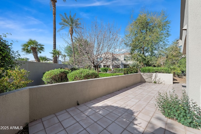 view of patio with a balcony