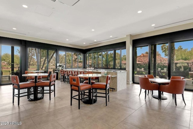 dining space featuring recessed lighting