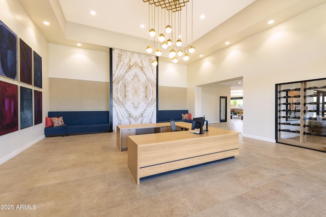 living room with recessed lighting, a high ceiling, a chandelier, baseboards, and stairs