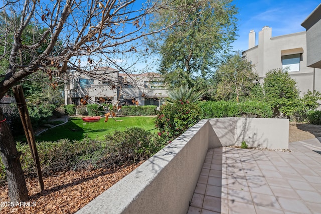 surrounding community with a patio area