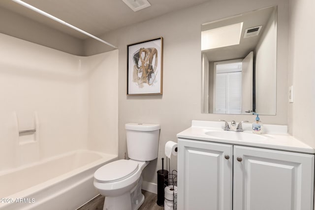 4722 W Via Cynthia, Glendale, AZ 85301 - bathroom featuring vanity, wood finished floors, and  shower combination