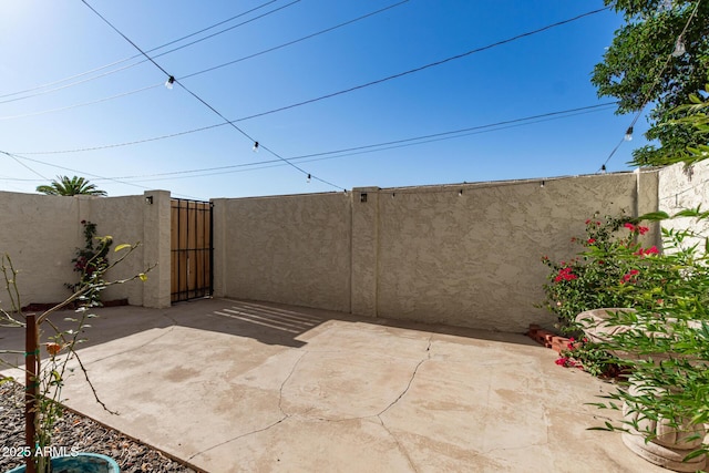 4722 W Via Cynthia, Glendale, AZ 85301 - view of patio featuring a gate