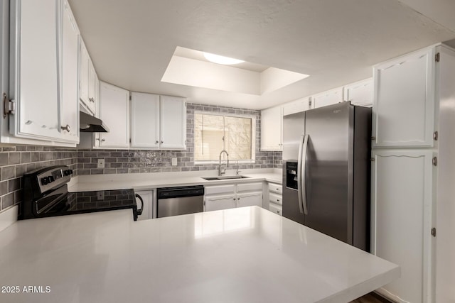 4722 W Via Cynthia, Glendale, AZ 85301 - kitchen with stainless steel appliances, light countertops, backsplash, and white cabinetry