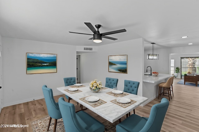 dining room with recessed lighting, ceiling fan, light wood-type flooring, visible vents, and baseboards