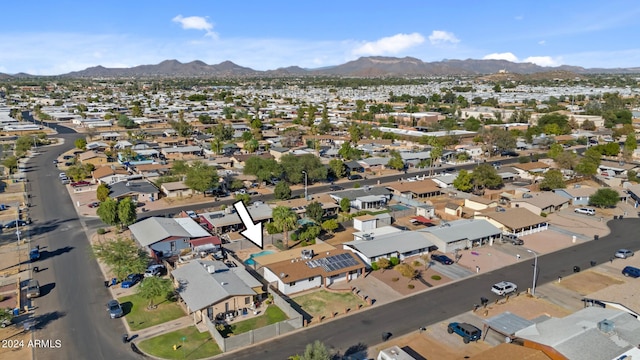 drone / aerial view with a residential view and a mountain view