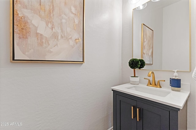 2625 N 24th St Unit 22, Mesa, AZ 85213 - bathroom featuring vanity and a textured wall