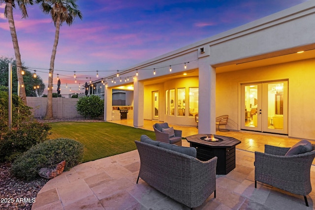 2625 N 24th St Unit 22, Mesa, AZ 85213 - view of patio with an outdoor fire pit and french doors