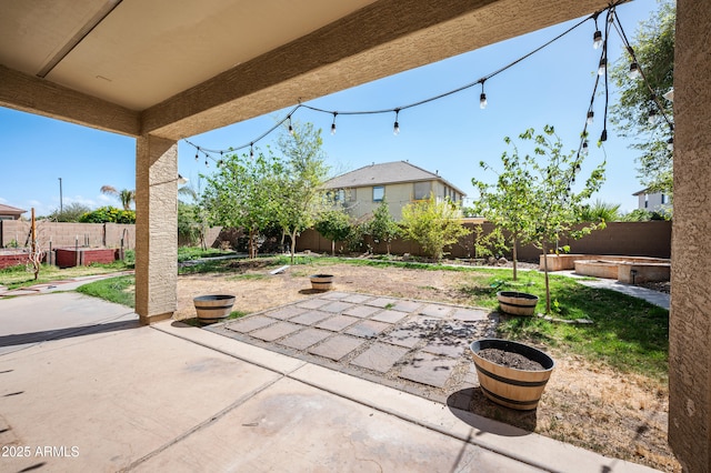 view of patio featuring a fenced backyard