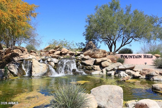 view of community sign