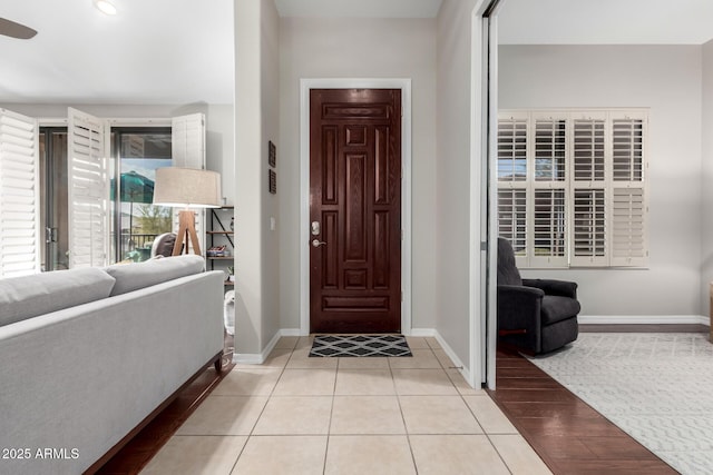 foyer featuring light tile patterned floors