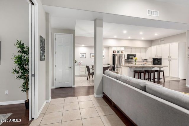 living room featuring light tile patterned floors