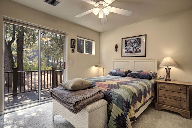 bedroom featuring access to outside, ceiling fan, and light colored carpet