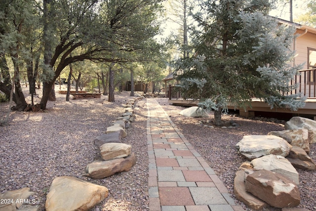 view of yard with a wooden deck