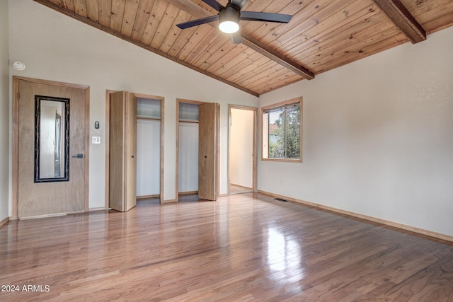 unfurnished bedroom with ceiling fan, vaulted ceiling with beams, wood ceiling, and light hardwood / wood-style flooring